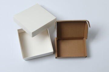 empty paper box with lid on white background, top view
