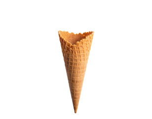 Close-up of an empty waffle cone against a solid black background