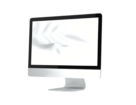 Angled silver computer monitor with blank screen against a black background