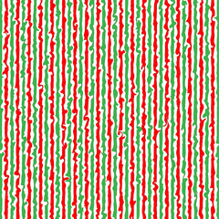 Seamless pattern of vertical wavy stripes in green and red tones  on white background. The irregular, twisted lines create resembling hand-painted or free-flowing brushes
