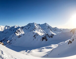Panoramic view of snow-capped mountains under a vibrant blue sky