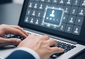 Hands typing on laptop displaying a grid of user profile icons with one highlighted