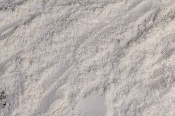 white powdered sugar made from ground sugar, white crumbly powdered sugar made from natural...