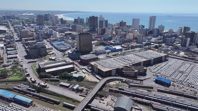 Aerial view of the South African tourist city of Durban, seen from above the port. The popular North Beach surfing venue visible in background.