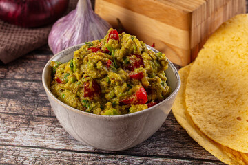 Green spicy Mexican guacamole dip