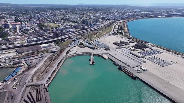Aerial view of the port of Gqeberha, formerly known as Port Elizabeth, on the South African east coast. The port is a major export hub for motor vehicles and agricultural products, especially citrus.