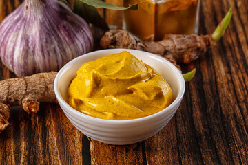 Indian yellow spicy curry sauce