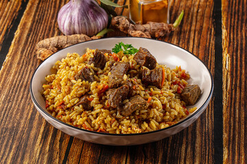 Asian traditional pilaf with beef