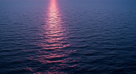 Sunset reflection on ocean water abstract nature background tranquil scenery