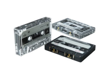 Three Cassette Tapes in Clear and Black Cases on Transparent Background Retro Music Audio Technology Vintage Sound Recording Media Analog Format Still Life Detailed Presentation