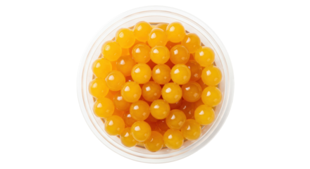 Orange tapioca pearls in a bowl isolated, boba balls for bubble tea on transparent background, sweet dessert ingredient