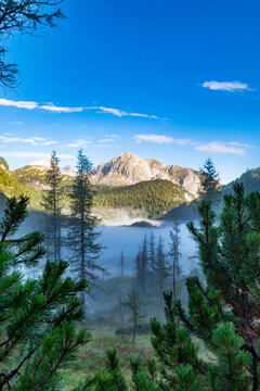 Misty alpine landscape above Funtensee in the Berchtesgaden Alps