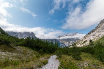 Panoramic view over the Wimbach Valley with alpine peaks and drifting clouds, Berchtesgaden Alps