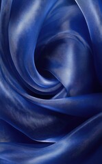 Fototapeta premium Deep blue, flowing fabric, swirled texture