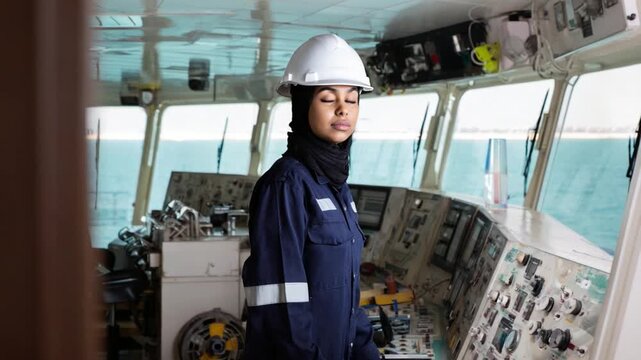 Navigating the Seas of Leadership: A confident female mariner stands at the helm of a ship, surrounded by intricate navigational instruments and the endless expanse of the ocean.