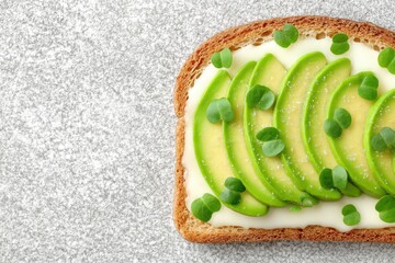 Freshly sliced green avocado on whole grain toast topped with microgreens and a sprinkle of sea salt captured in a bright natural composition for a wholesome culinary setting