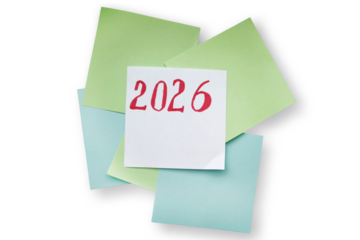 White note with red handwritten number 2026 on colorful sticky notes. Concept of new year, planning, goals, future, business, and holiday celebration