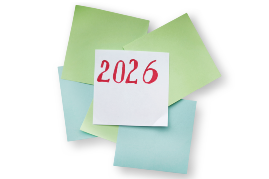 White note with red handwritten number 2026 on colorful sticky notes. Concept of new year, planning, goals, future, business, and holiday celebration