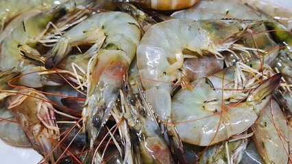 Fresh raw shrimp and prawns are a delicious, healthy seafood market meal