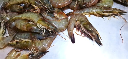 Fresh raw shrimp and prawns are a delicious, healthy seafood market meal