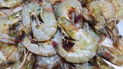 Fresh raw shrimp and prawns are a delicious, healthy seafood market meal