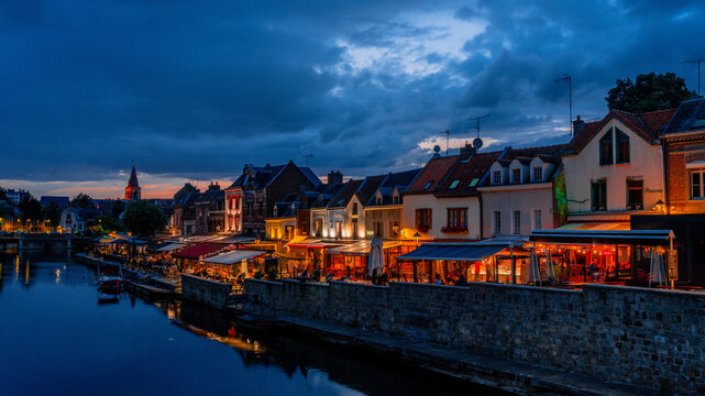 Illuminated Amiens riverside at Night, France