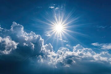 Brilliant sun radiating through clouds against a vibrant blue sky