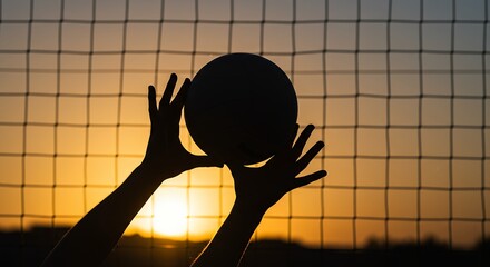 Silhouette hands reaching for volleyball against sunset sky