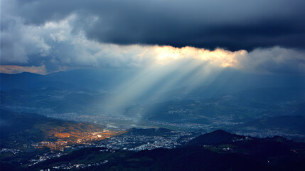 darkness. Beam of sunlight breaking through dark storm clouds, illuminating the ground. travel magazines, destination branding, designed for outdoor magazines and nature guides.
