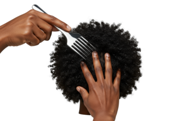Groomed brown-skinned adult male hand with chrome pick, styling black afro hair, serum bottle beside, on a transparent studio background, professional hair care concept