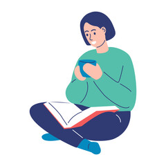 A young woman relaxing while sitting cross-legged with an open book, holding a warm cup of coffee or tea and smiling, embodying a cozy and peaceful moment of self-care