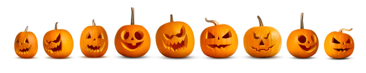 Pumpkins with spooky carved faces on white background. Halloween decoration