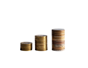Three stacks of metallic coins increasing in height, set against a stark black backdrop