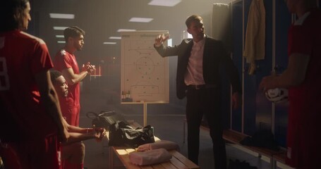 Soccer Coach Standing in Front of His Team in the Locker Room, Pointing at a Whiteboard with a Plan. Football Players Listen to Game Strategy and Tactics, Making High Fives to Encourage the Team - Powered by Adobe