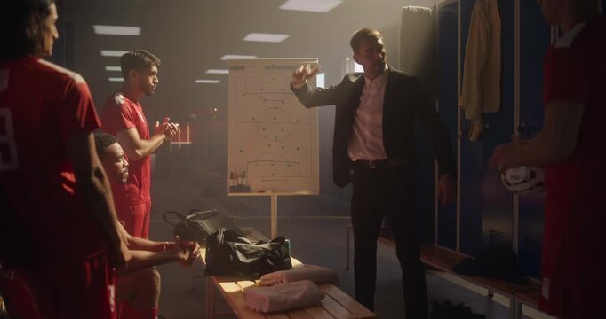 Soccer Coach Standing in Front of His Team in the Locker Room, Pointing at a Whiteboard with a Plan. Football Players Listen to Game Strategy and Tactics, Making High Fives to Encourage the Team