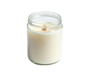 Jar candle, glass container, wooden wick, off-white wax, isolated on black
