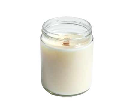 Jar candle, glass container, wooden wick, off-white wax, isolated on black