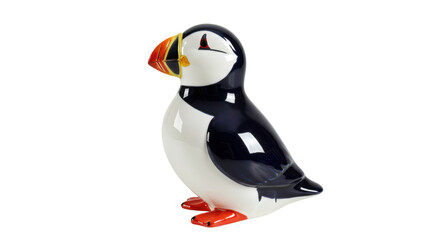 Ceramic puffin figurine isolated on transparent background, colorful bird statue for home decor and animal collection