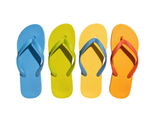 A vibrant row of four flip-flops in primary and secondary bright colors