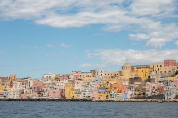 Fototapeta premium Colorful coastal houses of Corricella, Procida seen from sea
