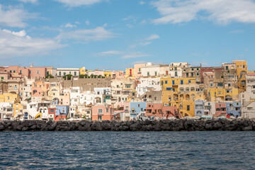 Fototapeta premium Colorful coastal houses of Corricella, Procida seen from sea