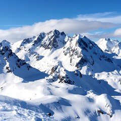 Naklejka premium Snowy mountain peaks under a clear sky (1)