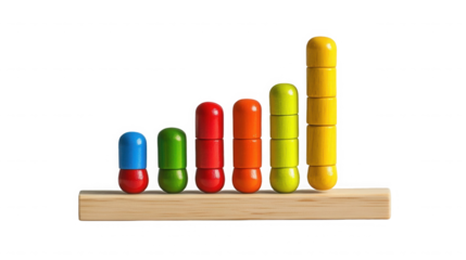 Colorful wooden toy blocks arranged as a rising bar graph on a wood surface on transparent background