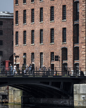 People walking in the Royal Albert Dock, Liverpool, England, United Kingdom.