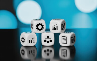 Conceptual image of business process management featuring dice with icons for strategy, workflow, and data analysis on a reflective surface