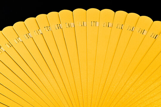 A yellow object with a lot of numbers on it
