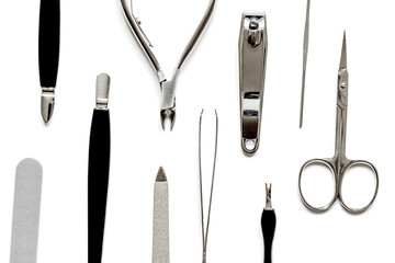 nail care - manicure set on white background top view
