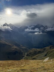rays of sun through the clouds in the mountains of Austria