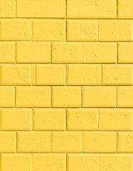 Bright yellow brick wall texture