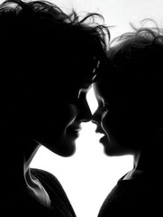 Fototapeta premium A woman and child in silhouette share a playful moment, almost touching noses against a vibrant background.